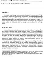 Damage Detection in a Masonry Arch Bridge Model Using Outlier Analysis