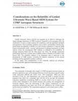 Considerations on the Reliability of Guided Ultrasonic Wave-Based SHM Systems for CFRP Aerospace Structures